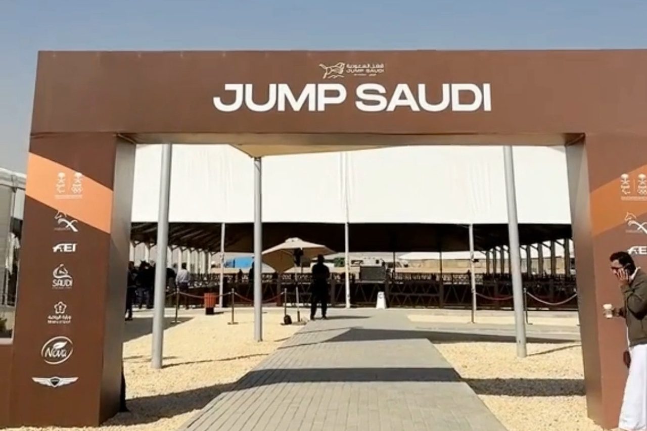 A fabricated, branded entrance gateway at an event